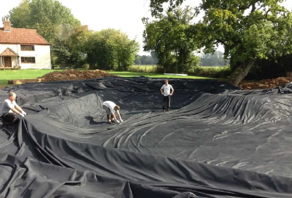 Large garden pond EP liner installation