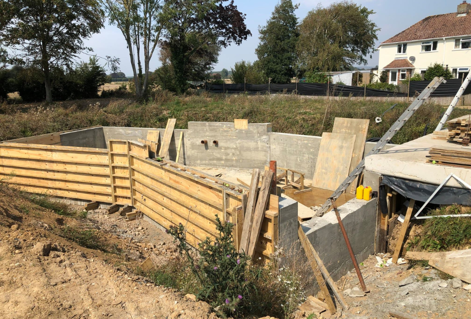 Lining a large swimming pond build in West Sussex