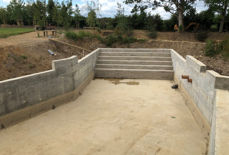 Lining a large swimming pool build in West Sussex